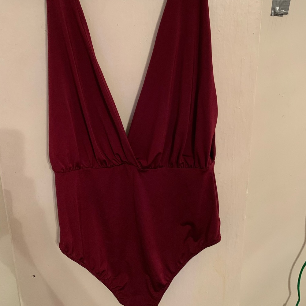 NWOT. Body suit. M